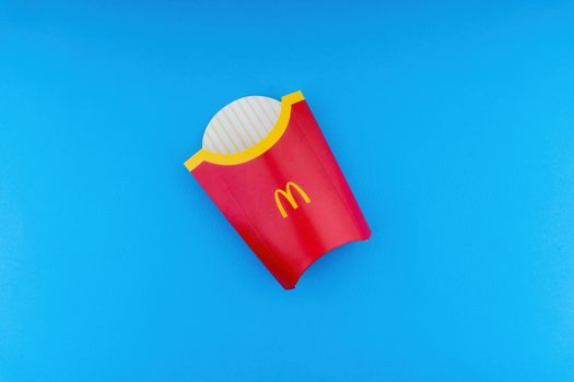 Kuala Lumpur, Malaysia - October 19, 2020 : McDonalds French fries  box on blue background