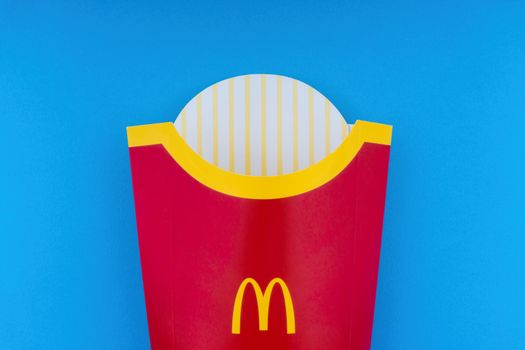 Kuala Lumpur, Malaysia - October 19, 2020 : McDonalds French fries  box on blue background