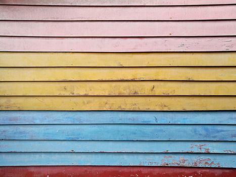 pink yellow blue red plank wooden board background wall