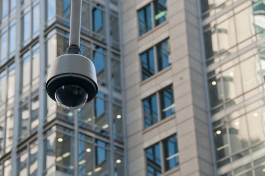 CCTV surveillance security dome camera in city center