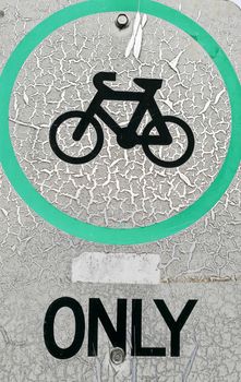 Only bicycle white defective traffic sign.