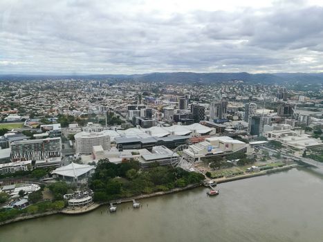 Wide bird eye view of Brisbane South bank scene in rainy afternoon