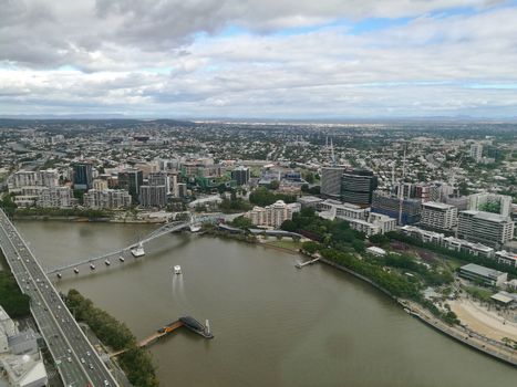 Wide bird eye view of Brisbane South bank scene in rainy afternoon