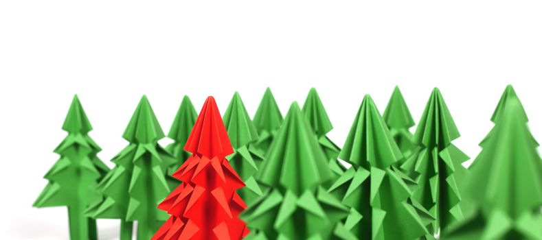Origami Christmas trees of green craft paper isolated on white background