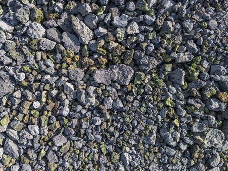 gray and green metallurgical slag macadam stone bedding - full frame background and texture.