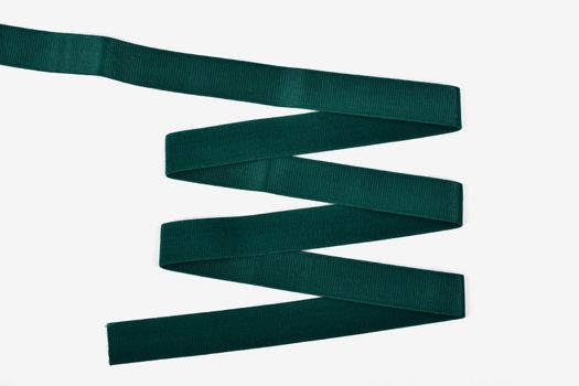 emerald Underwear elastic band for clothes and bras on a white background, zigzag. Isolated.