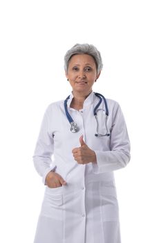 Asian mature female medical doctor with stethoscope isolated on white background, thumb up gesture