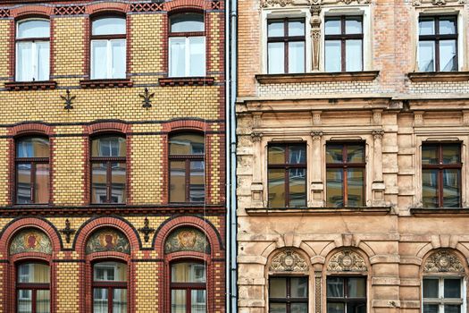 fragment of the facade of historic tenement houses in Poznan