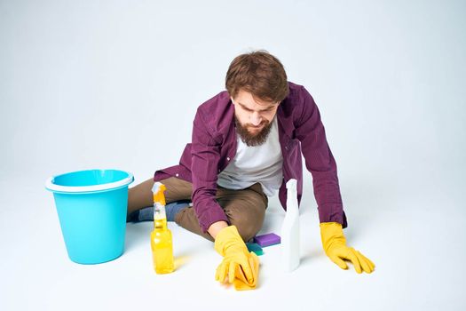 man wearing rubber gloves cleaning interior service professional. High quality photo