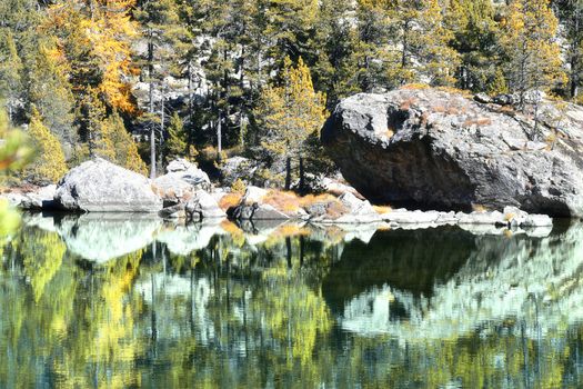 The Serva lake, a splendid alpine lake, in the natural park of Monte Avic in the Aosta valley