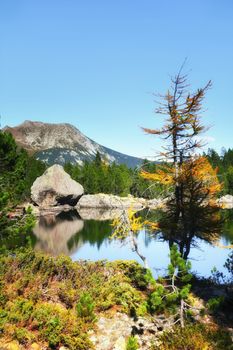 The Serva lake, a splendid alpine lake, in the natural park of Monte Avic in the Aosta valley