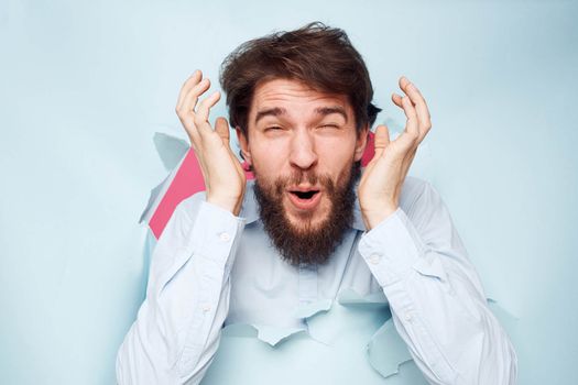 man looking out of the wall wearing shirt office emotions lifestyle work. High quality photo