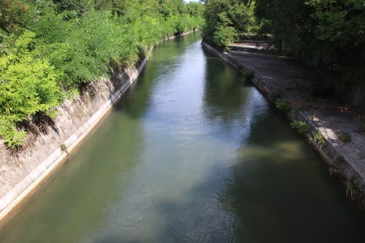View of the a small river  in the Brescia countryside in Italy