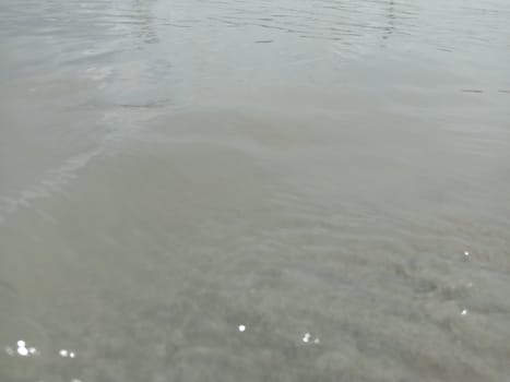 sand and water wave view in river