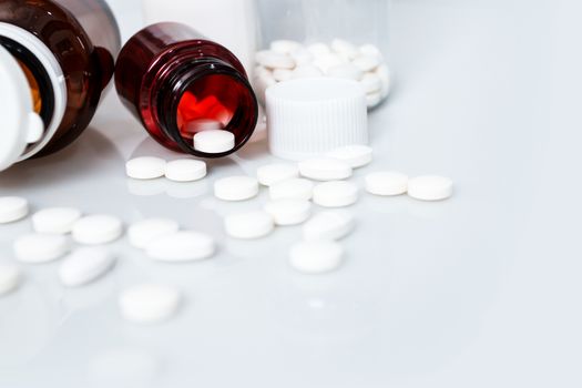 Medical concept, White pills for treatment on white background.