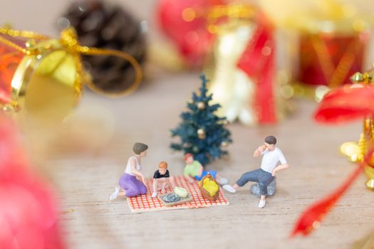 Miniature people, Happy family celebrating A Christmas  , Christmas and Happy New Year concept.