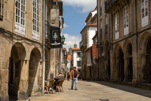 Santiago de Compostela, Spain, May 2018: View on the arcade streets of the old town of Santiago de Compostela in Spain