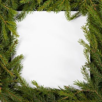 Natural fir Christmas tree square border frame isolated on white , copy space for text