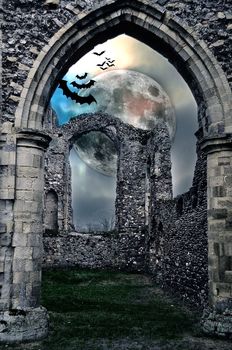 Very spooky Halloween castle in the moonlight