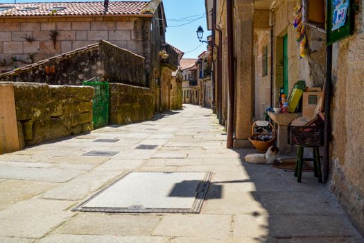 Combarro, Spain, May 2018: View on the narrow strees of coastal village Combarro in Galicia, Spain