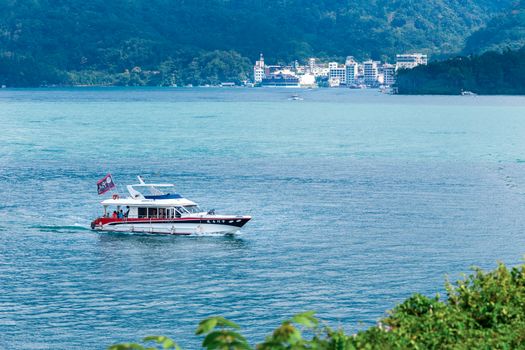 Hop-On Hop-Off Boat in Sun Moon Lake, the largest body of water in Taiwan and tourist attraction. There are 3 main piers at Sun Moon Lake
