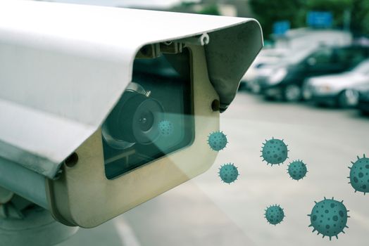 security CCTV camera at car park entrance of supermarket with virus or germ to be scanned before entering, concept of COVID-19 spread and prevention, shallow depth of field, filter effect