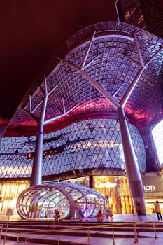 Lighting decoration in front of ION Orchard shopping mall at night time. ION Orchard brings together the world's best-loved brands in flagship, concept and lifestyle stores.