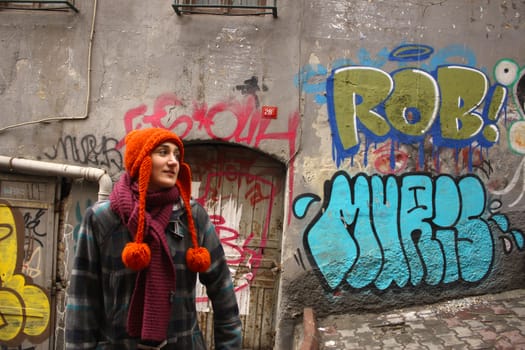 Young girl portrait on the urban street art background, Istanbul, turkey