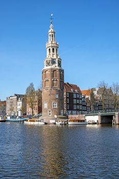 City scenic from Amsterdam in the Netherlands with the Montelbaan tower