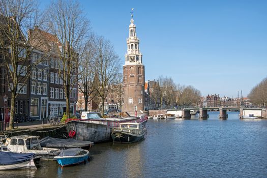 City scenic from Amsterdam in the Netherlands with the Montelbaan tower