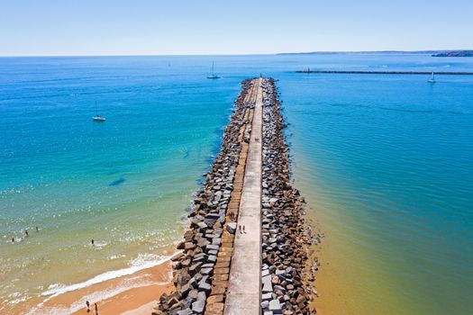 Top shot from breakwater at the entrance of Portimao harbor in the Netherlands