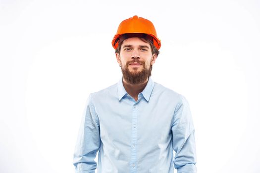 Man in working uniform orange hard hat lifestyle official. High quality photo