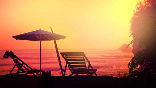 Lonely sun loungers on a tropical beach during sunset.