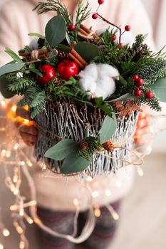 Christmas decoration with carnations, chrysanthemums santini, brunia and fir. Christmas spirit and mood