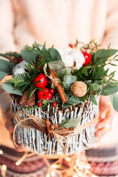 Christmas decoration with carnations, chrysanthemums santini, brunia and fir. Christmas spirit and mood