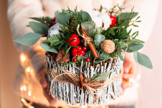 Christmas decoration with carnations, chrysanthemums santini, brunia and fir. Christmas spirit and mood