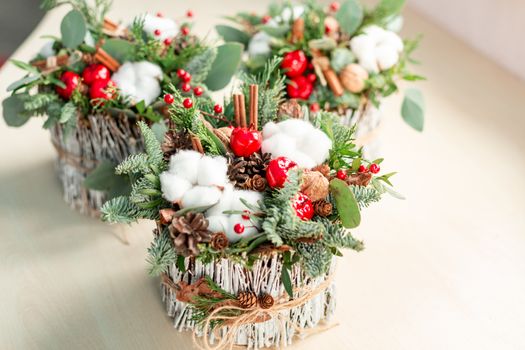 Christmas decoration with carnations, chrysanthemums santini, brunia and fir. Christmas spirit and mood