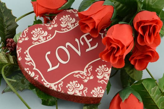 A lovely red heart shaped box for gift giving during a time of celebration and romance.