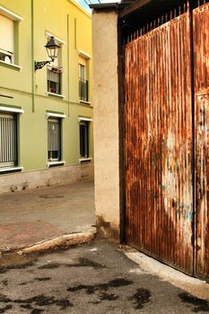 Streets, majestic facades, windows and balconies of Elche city. Alicante province, Spain.