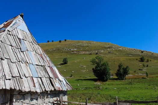 Part of the house and roof of a Bosnian house in the old Bosnian village of Lukomir on the Bjelasnica mountain.