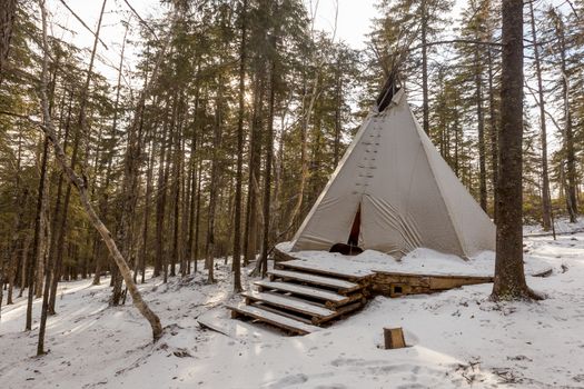 The pristine nature of the Zeya reserve. White chum wigwam stands in the middle