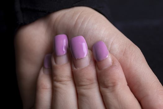 Overgrown manicure. Female hands with overgrown nails. Time for correction gel polish. nail care concept stock photo