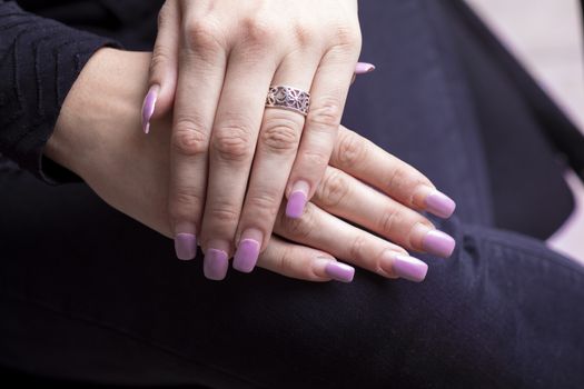 Overgrown manicure. Female hands with overgrown nails. Time for correction gel polish. nail care concept stock photo