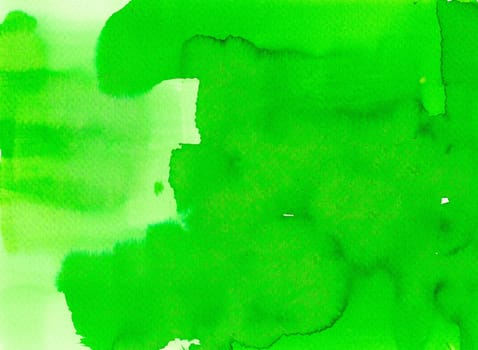 Abstract background of watercolor on paper texture, hand painted in green