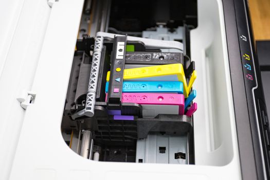 An ink cartridge or inkjet cartridge is a component of an inkjet printer that contains the ink four color