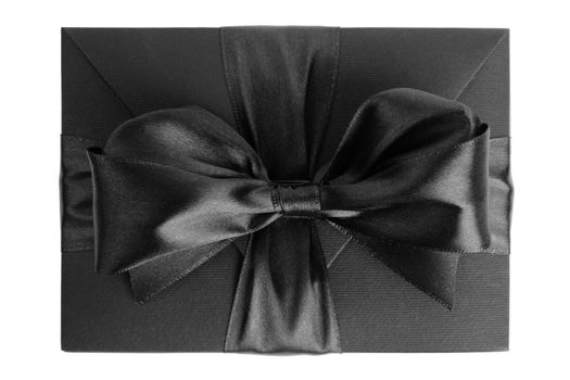 Black friday gift, paper box with silk ribbon bow isolated on white background