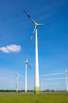 Wind turbines in front of a blue sky seen in Germany