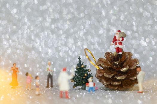 Miniature people, Happy family celebrating A Christmas  , Christmas and Happy New Year concept.