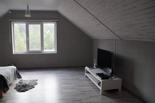 attic interior in white and gray tones close-up