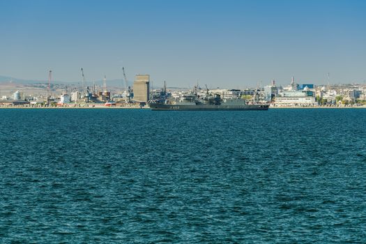Hydra-class flagship of the Hellenic Navy moored outside the city port, during a national holiday..